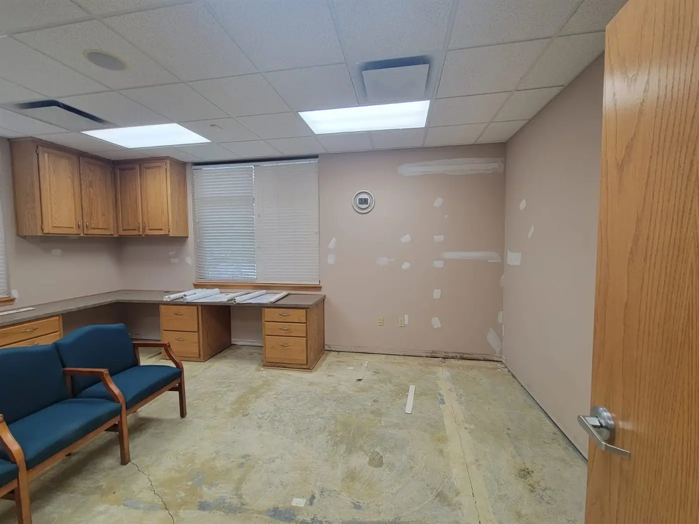 Completed office suite with new cabinetry and ceiling tiles