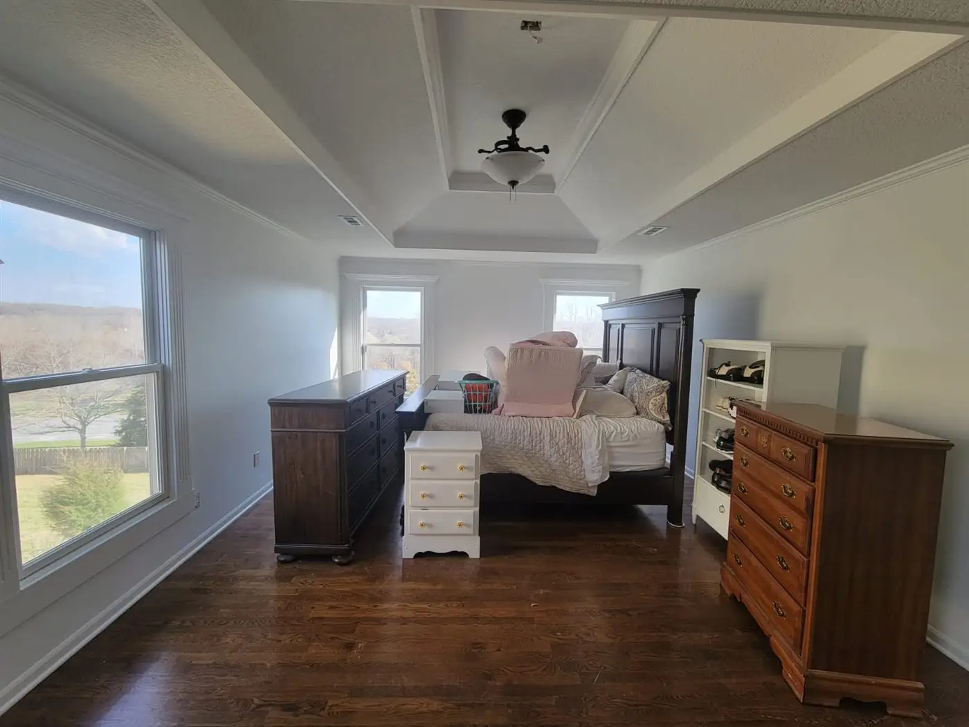 A finished room with fresh paint and natural light from a skylight